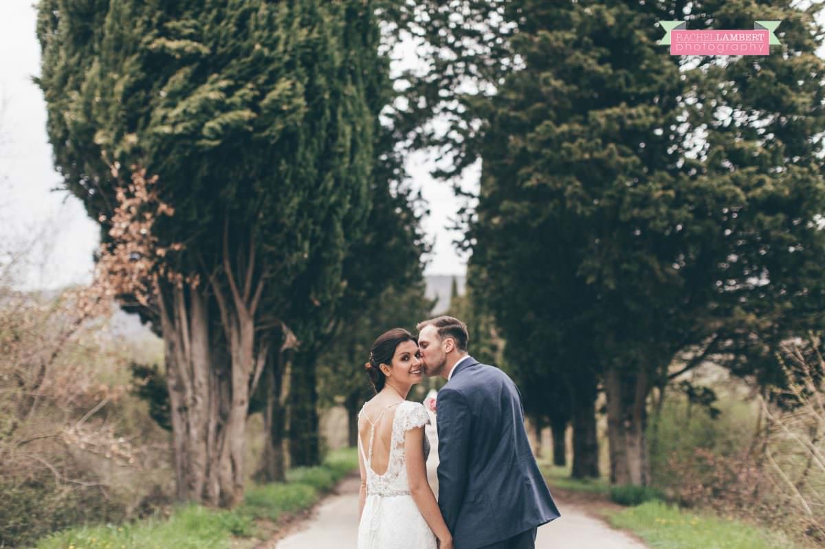 bride and groom portrait wedding in italy colour cortona tuscany cyprus trees